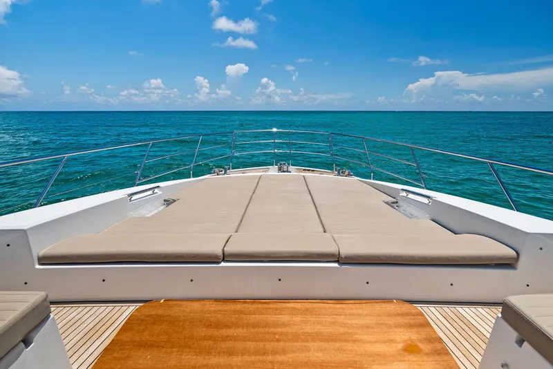 Slide: The Image of Azimut 77S 2019 yacht deck with ocean view and sun loungers. - 15