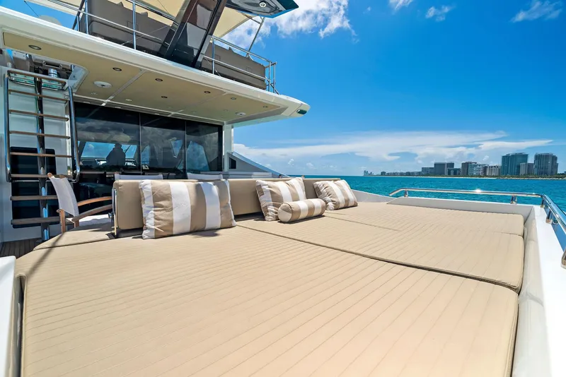 Slide: The Image of Luxurious 2019 Azimut 77S yacht with sunbathing deck and ocean view. - 8