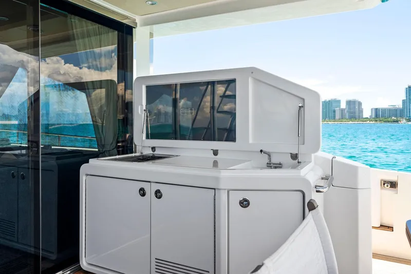 Slide: The Image of Azimut 77S 2019 yacht deck with sleek cabinetry and ocean view. - 9