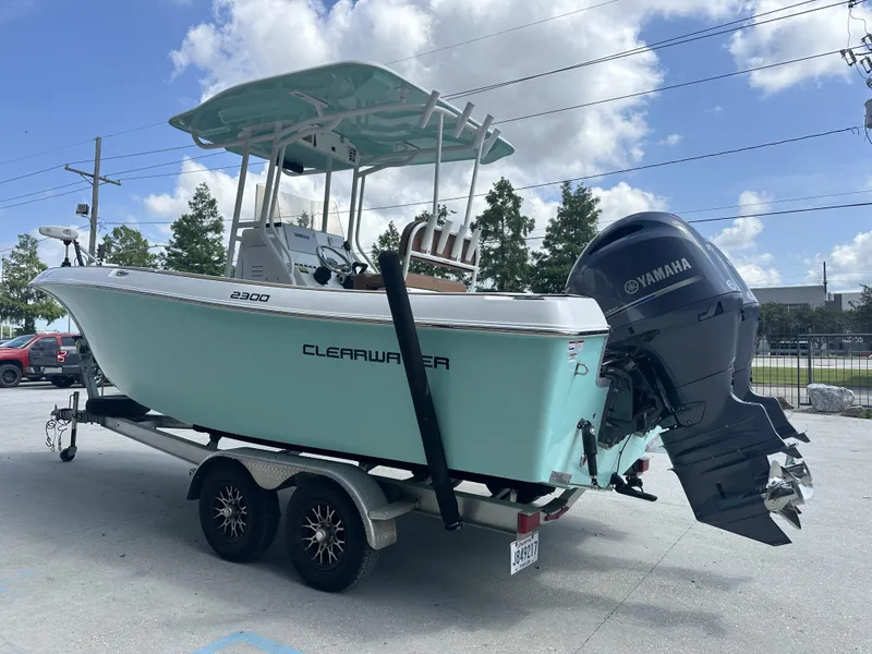 Slide: The Image of 2019 Clearwater 2300 boat on trailer with Yamaha outboard motor. - 13