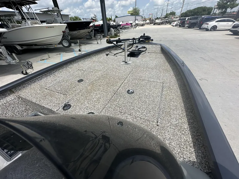 Slide: The Image of 2015 Tracker Pro Team 190 TX fishing boat on display at a dealership. - 10