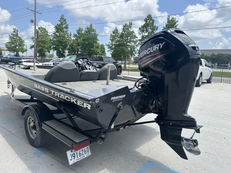 Slide: The Image of 2015 Tracker Pro Team 190 TX bass boat with Mercury outboard motor. - 3