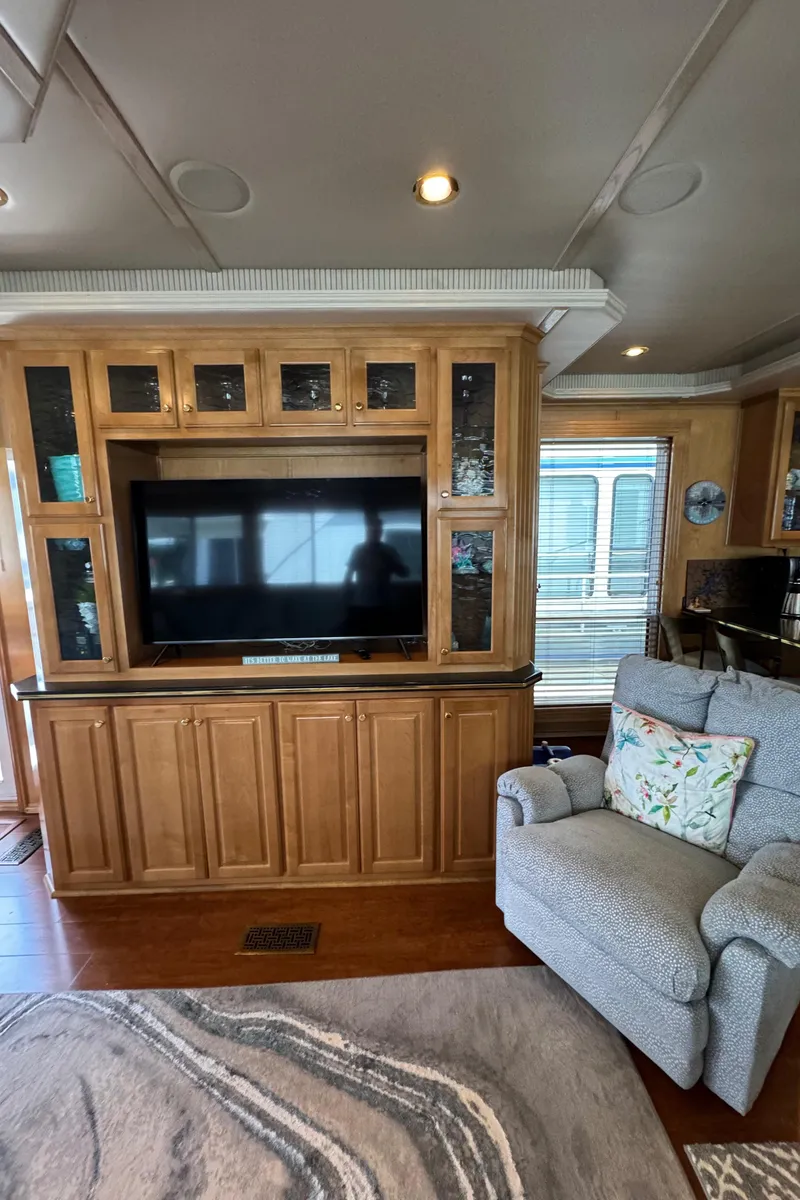 Slide: The Image of 2005 Fantasy Houseboat 19x90 deck with compass design. - 19