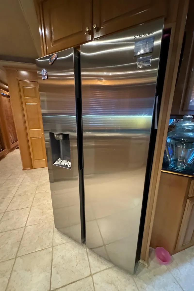 Slide: The Image of Living area of 2005 Fantasy Houseboat 19x90 with TV and recliner. - 26