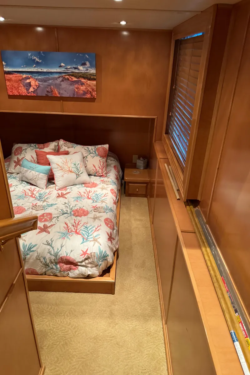 Slide: The Image of Luxurious kitchen in a 2005 Fantasy Houseboat 19x90 with granite countertops and wooden cabinets. - 32