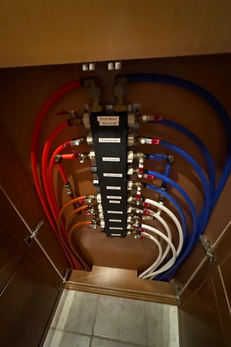 Slide: The Image of Cozy twin bedroom in 2005 Fantasy Houseboat 19x90 with plush toys and nautical-themed bedding. - 49