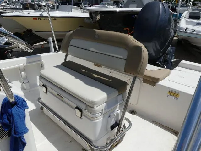 Slide: The Image of 2014 Key West 176BR boat with Yamaha outboard motor in a marina. - 10