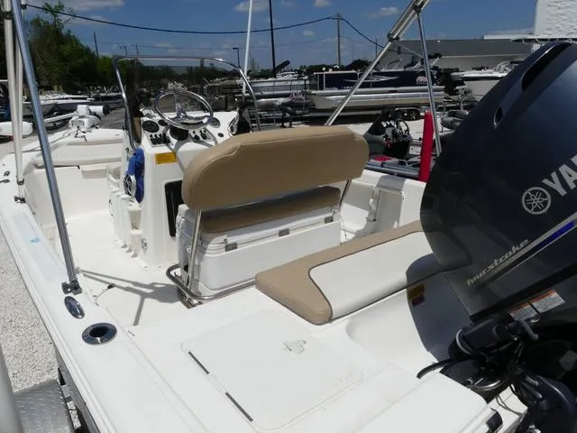 Slide: The Image of 2014 Key West 176BR boat with Yamaha outboard motor in a marina. - 8