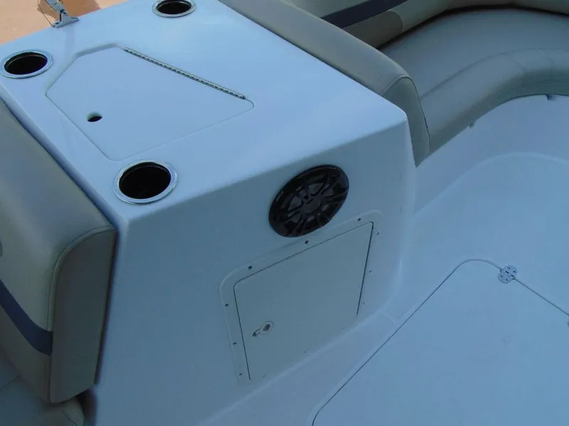 Slide: The Image of 2021 Hurricane SunDeck Sport 188 OB boat interior with seating and storage. - 8