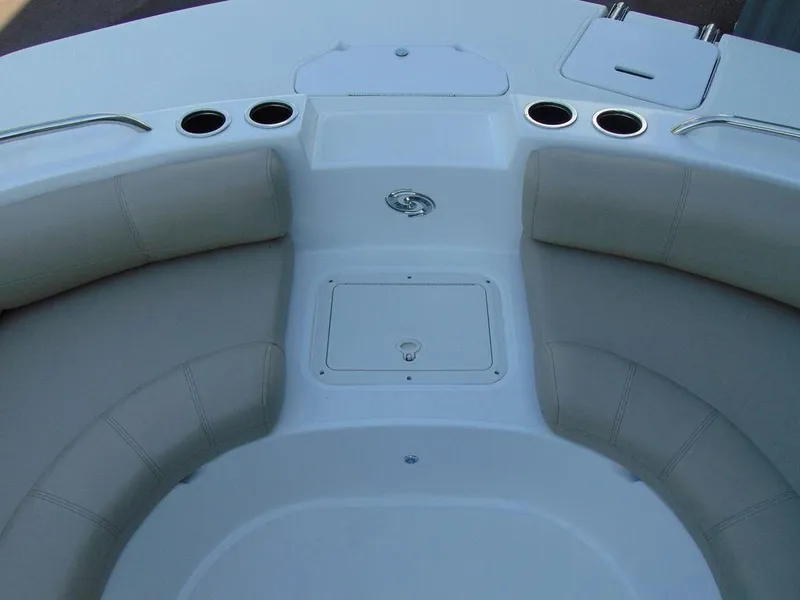 Slide: The Image of 2021 Hurricane SunDeck Sport 188 OB boat interior with cushioned seating and cup holders. - 9