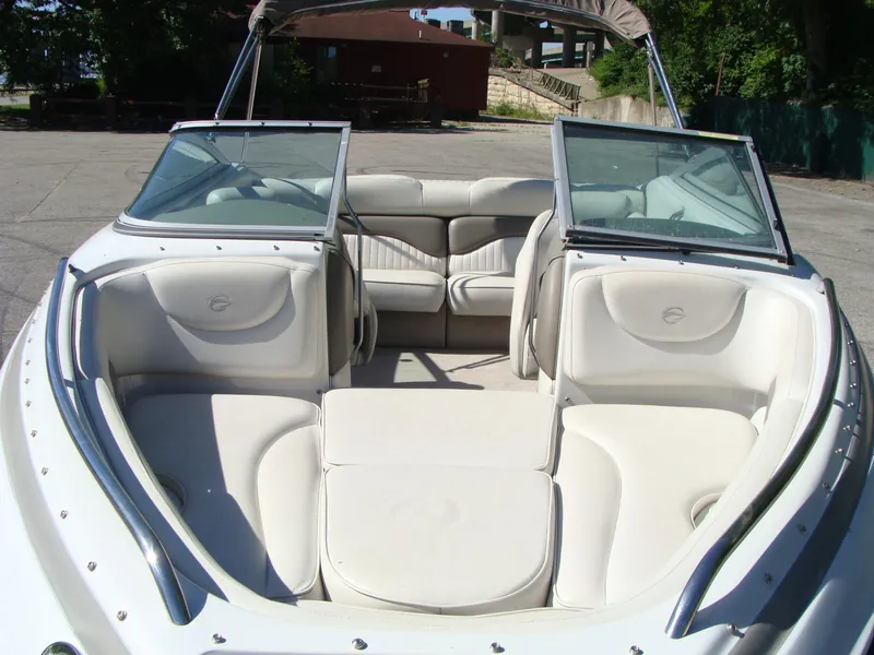 Slide: The Image of 2005 Crownline Bowrider 202 BR with spacious seating and open bow design. - 11