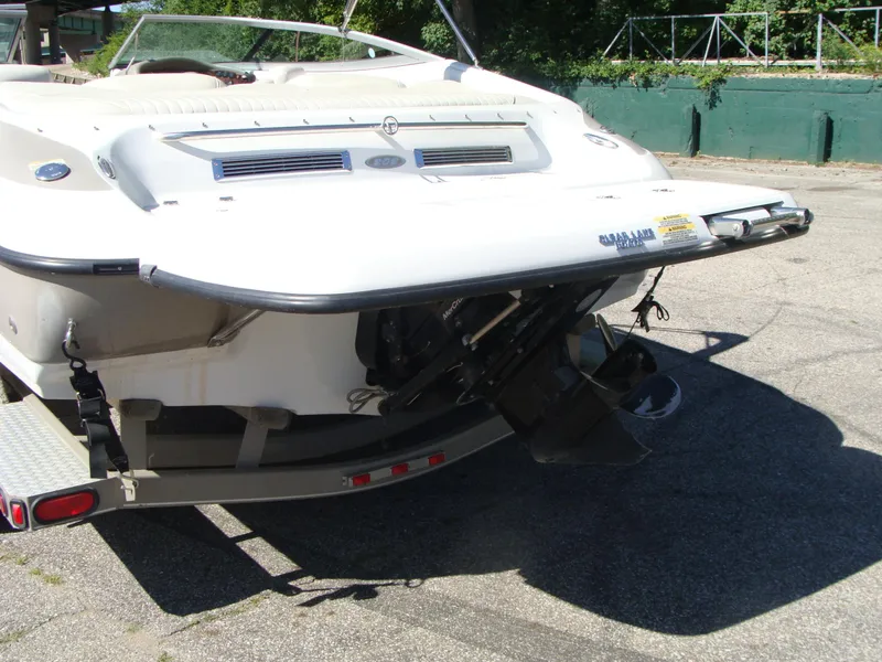 Slide: The Image of 2005 Crownline Bowrider 202 BR boat rear view on trailer. - 8