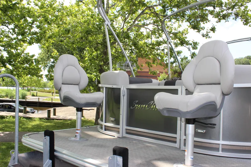 Slide: The Image of 2021 SunChaser Geneva Cruise 24 SB pontoon boat with comfortable seating. - 30