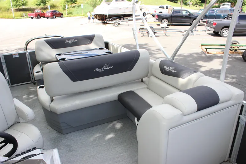 Slide: The Image of 2021 SunChaser Geneva Cruise 24 SB pontoon boat interior with plush seating. - 7