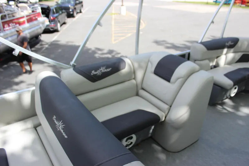 Slide: The Image of 2021 SunChaser Geneva Cruise 24 SB boat interior with comfortable seating. - 9