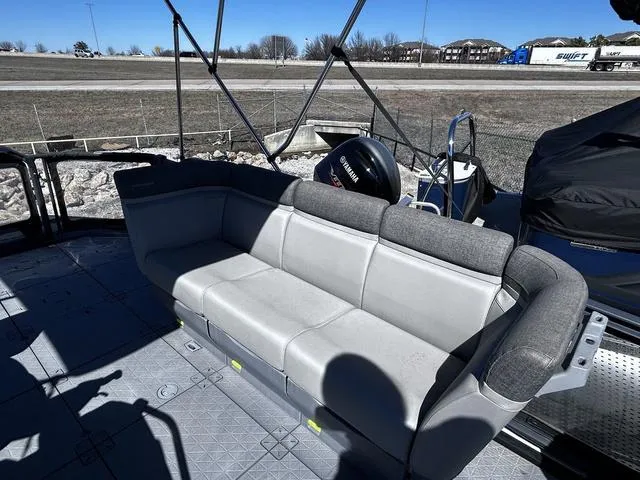 Slide: The Image of 2023 Sea-Doo Switch® 19-170 hp pontoon boat with comfortable seating and Yamaha engine. - 10