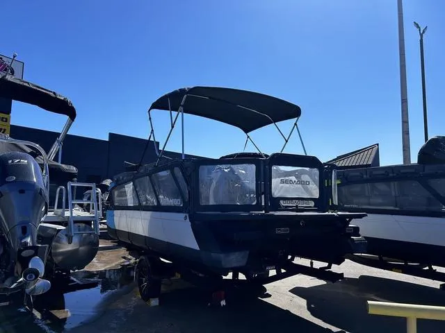 Slide: The Image of 2023 Sea-Doo Switch® Cruise 18-130 hp pontoon boat interior with steering console. - 5