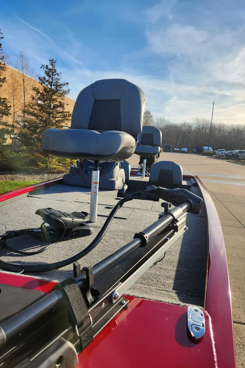 Slide: The Image of 2024 Tracker Pro 170 fishing boat with seating and equipment. - 2