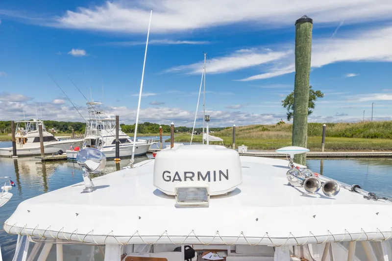 Slide: The Image of Little Harbor 34 Express Direct Drive 1990 boat docked with Garmin equipment. - 15