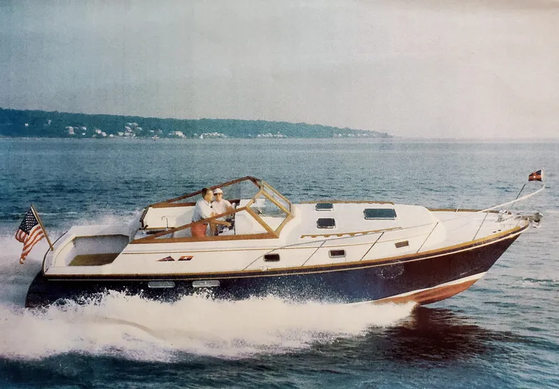 Slide: The Image of Ted Hood and his wife testing this boat - 22