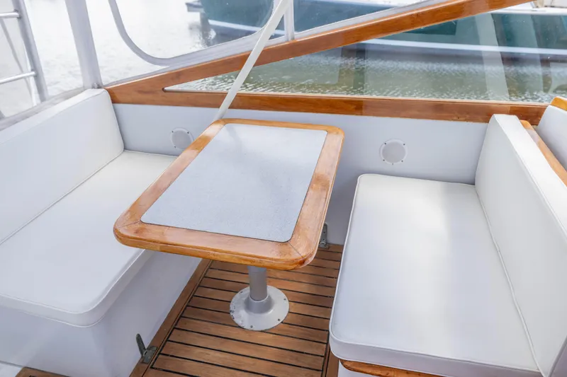 Slide: The Image of Interior seating area of 1990 Little Harbor 34 Express Direct Drive boat. - 8