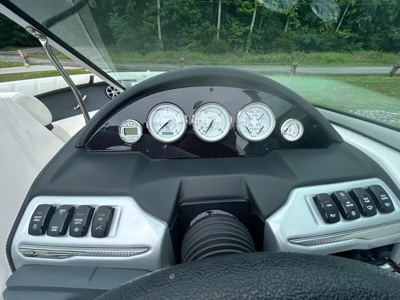 Slide: The Image of Dashboard of a 2019 Regal 2000 ES Bowrider boat with gauges and controls. - 6