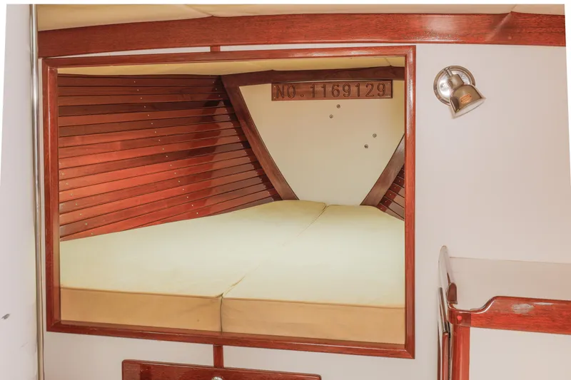 Slide: The Image of 2005 Morris M36 boat interior with cozy wooden cabin and bed - 15
