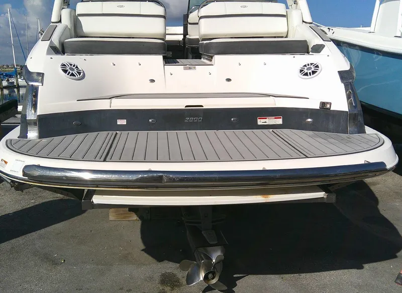 Slide: The Image of 2017 Regal 2800 Bowrider boat stern with swim platform and seating. - 10
