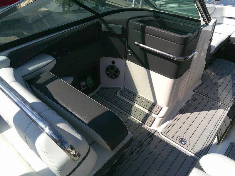 Slide: The Image of 2017 Regal 2800 Bowrider interior with seating and control panel. - 16