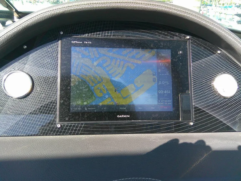 Slide: The Image of Garmin GPS display on 2017 Regal 2800 Bowrider dashboard. - 26