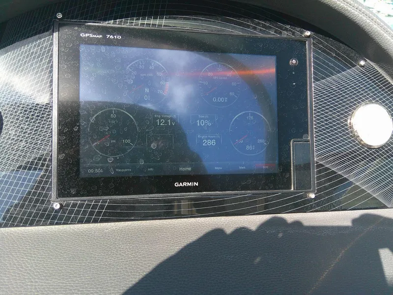 Slide: The Image of Garmin GPSmap 7610 display on 2017 Regal 2800 Bowrider dashboard. - 28