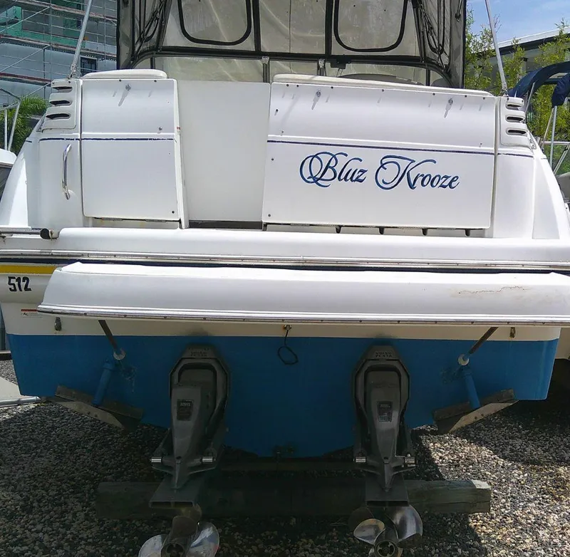 Slide: The Image of 2005 Larson Cabrio 330 boat named Bluz Krooze rear view. - 3