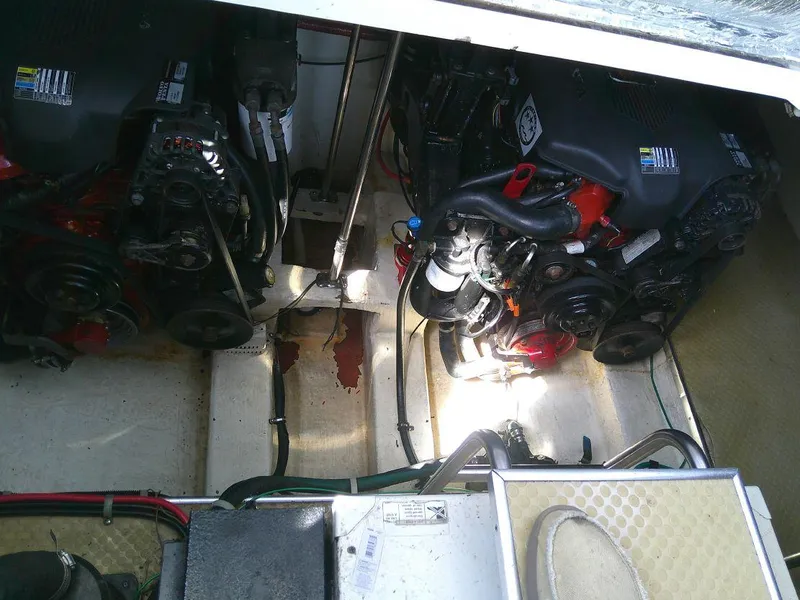 Slide: The Image of Engine compartment of a 2005 Larson Cabrio 330 boat. - 30
