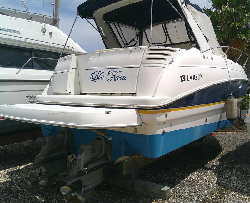 Slide: The Image of 2005 Larson Cabrio 330 boat named Blue Nooze on dry dock. - 5