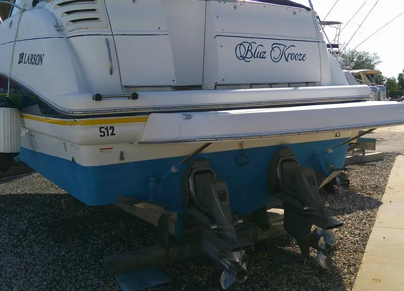 Slide: The Image of 2005 Larson Cabrio 330 boat named Blue Krooze with dual outboard motors. - 8