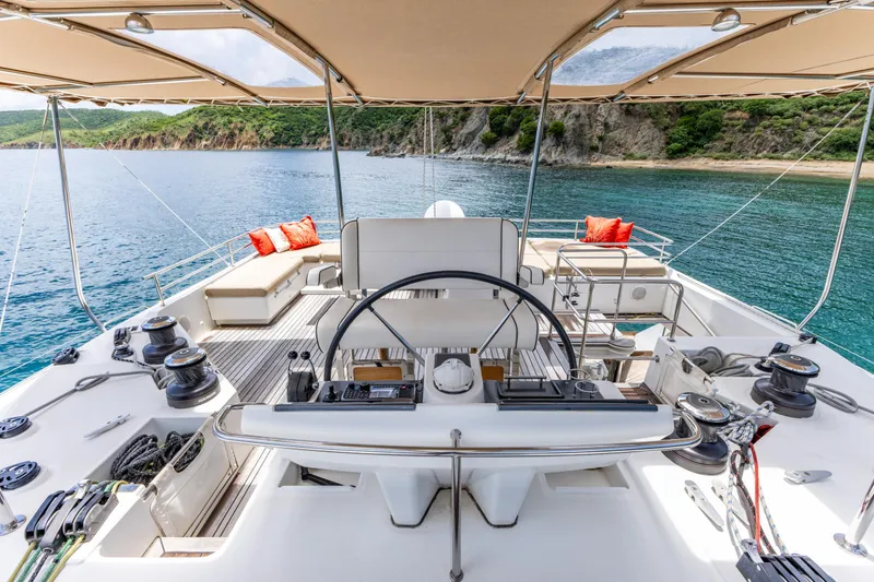 Slide: The Image of Luxurious 2012 Lagoon 560 yacht interior with scenic ocean view and elegant seating. - 25