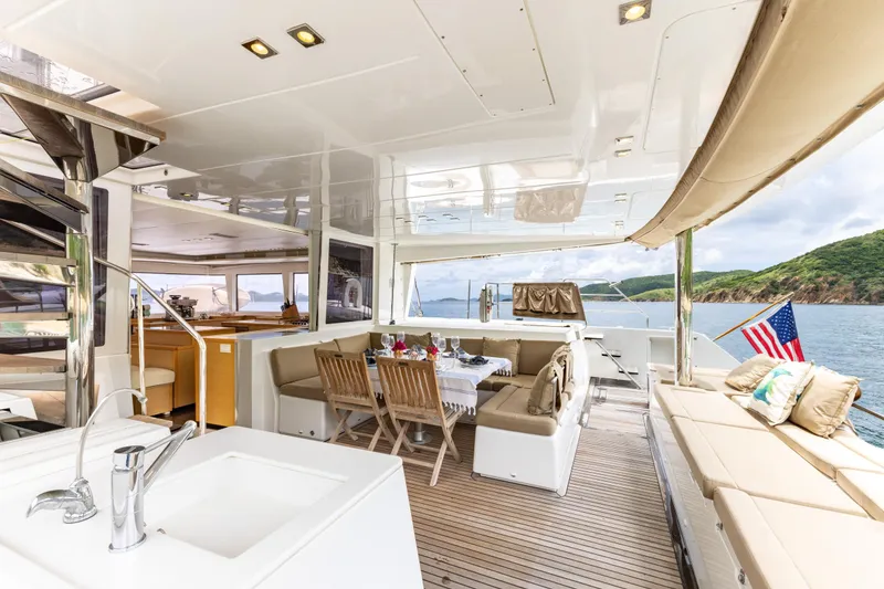 Slide: The Image of Luxurious 2012 Lagoon 560 yacht interior with elegant seating and ocean view. - 37