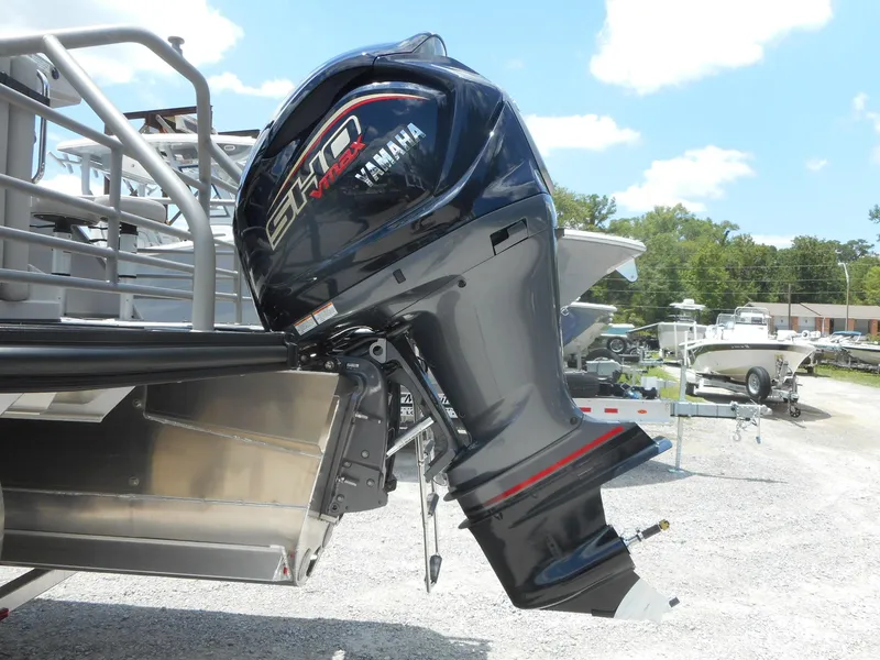 Slide: The Image of 2024 Starcraft CX 25 DL BAR with Yamaha outboard motor. - 2