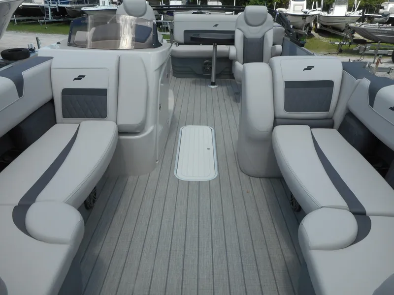 Slide: The Image of 2024 Starcraft CX 25 DL BAR pontoon boat interior with luxurious seating. - 9