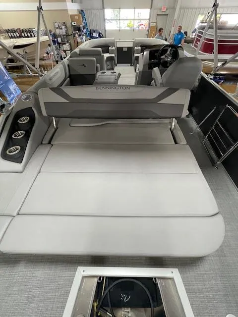 Slide: The Image of 2024 Bennington 21SXSB pontoon boat interior with spacious seating and modern design. - 9