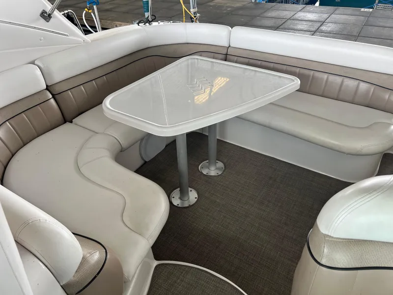 Slide: The Image of 2007 Four Winns 358 Vista boat interior with white seating and table. - 4