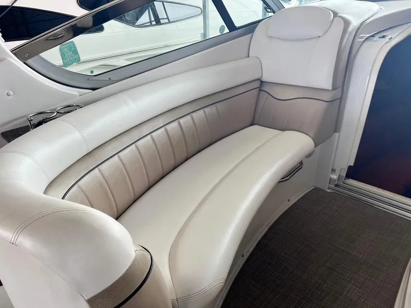 Slide: The Image of Luxurious white leather seating in 2007 Four Winns 358 Vista boat interior. - 6