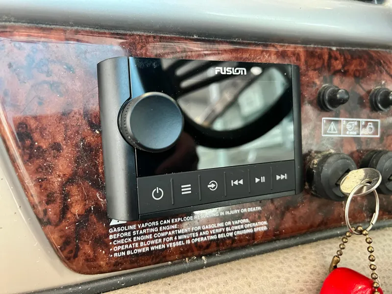 Slide: The Image of Fusion stereo system on 2007 Four Winns 358 Vista boat dashboard. - 14