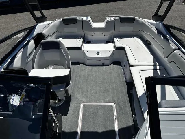 Slide: The Image of 2023 Yamaha Boats AR190 interior with spacious seating and modern design. - 3