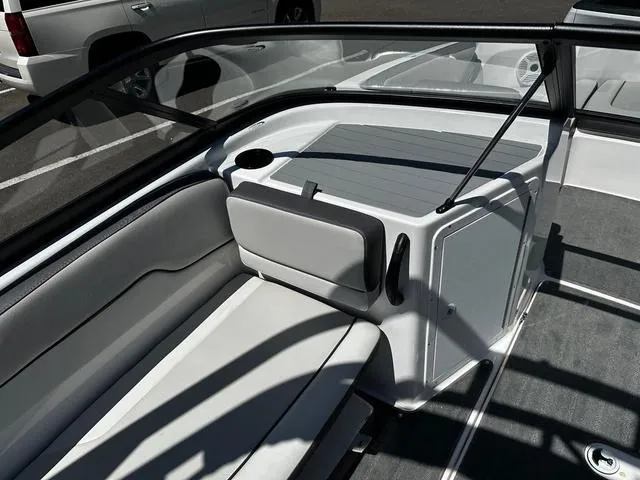 Slide: The Image of 2023 Yamaha Boats AR190 interior seating and storage area. - 5