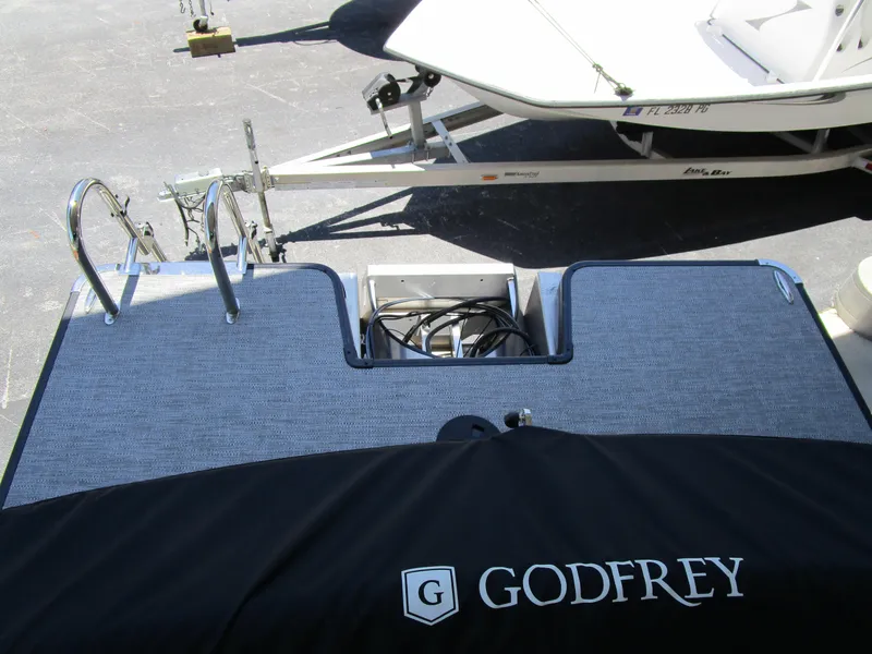 Slide: The Image of 2024 Sweetwater Entertainment SW 2286 MT pontoon boat rear deck with ladder and Godfrey cover. - 12