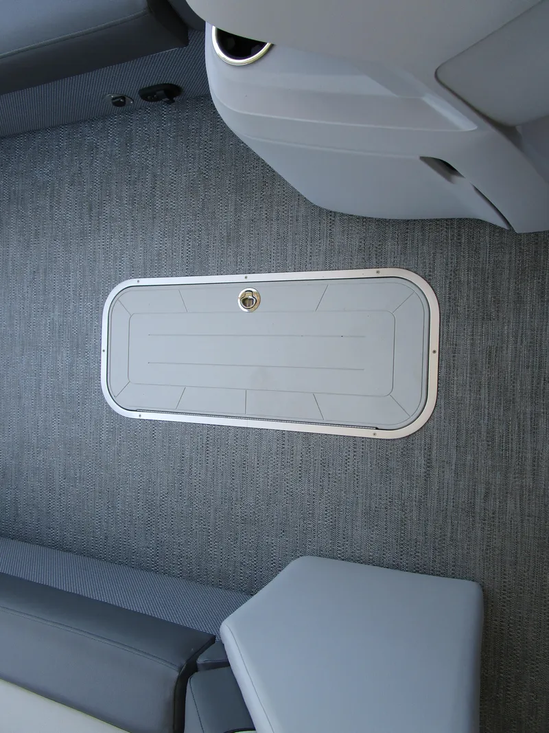 Slide: The Image of Interior of 2024 Sweetwater Entertainment SW 2286 MT pontoon boat with storage compartment. - 13
