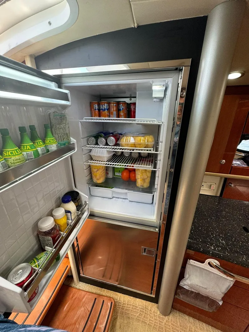 Slide: The Image of 2008 Formula 400 Super Sport yacht interior with stocked refrigerator. - 35