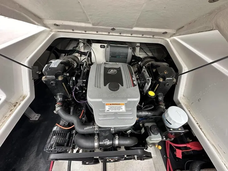 Slide: The Image of 2012 Crownline E1 boat engine compartment with a 4.3L MerCruiser engine. - 17