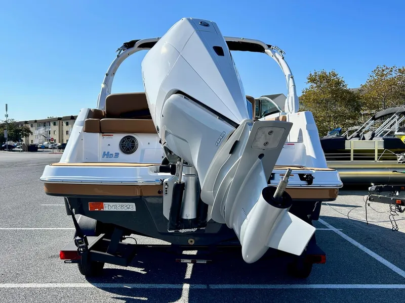 Slide: The Image of 2024 Four Winns HD3 OB boat with outboard motor, rear view. - 26